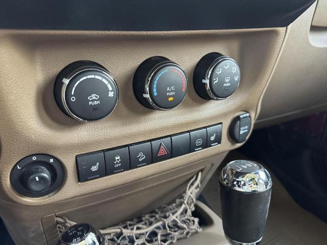 Photo of 2012 Deep Cherry Red Crystal Pearl Jeep Wrangler Unlimited