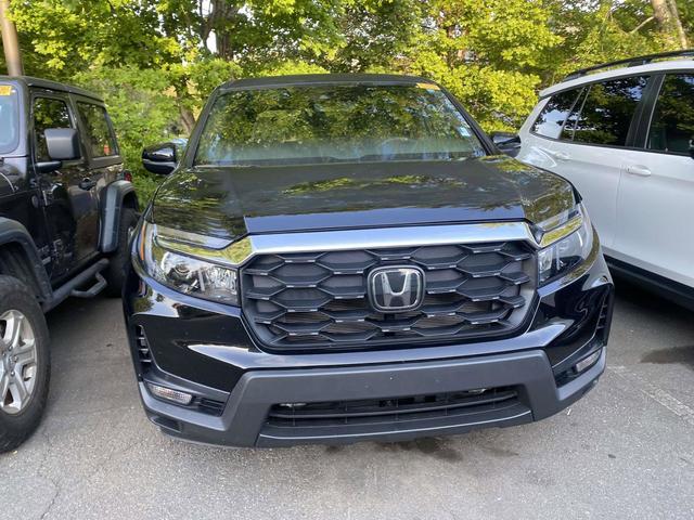 Photo of 2023 Crystal Black Pearl Honda Passport