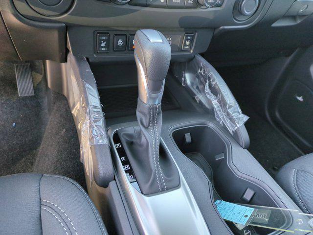 Photo of 2025 Cardinal Red Metallic Tricoat Nissan Frontier