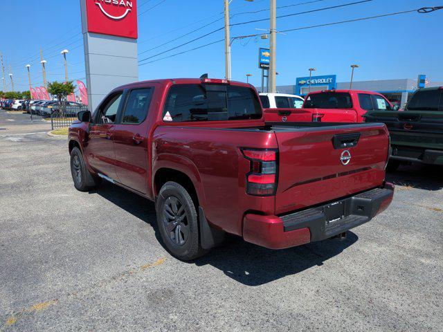 Photo of 2025 Cardinal Red Metallic Tricoat Nissan Frontier
