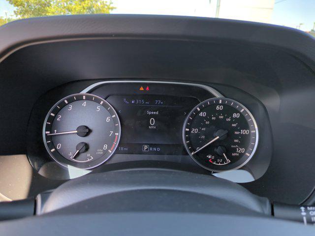Photo of 2025 Cardinal Red Metallic Tricoat Nissan Frontier