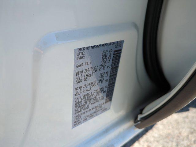 Photo of 2025 Glacier White Nissan Frontier