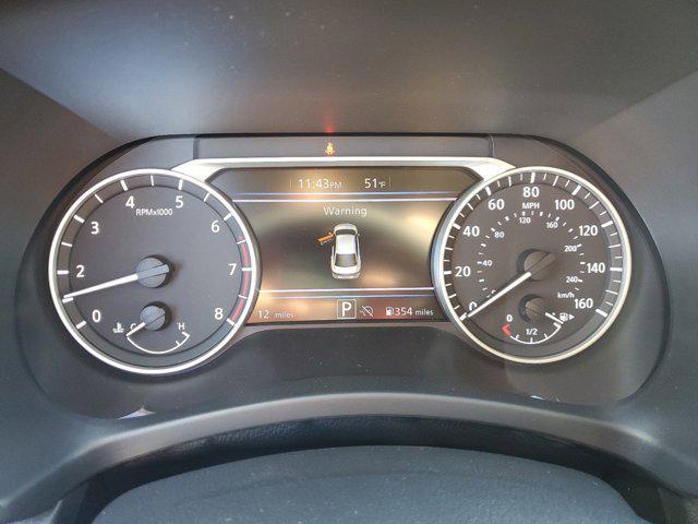Photo of 2025 Monarch Orange Metallic/Super Black Nissan Sentra