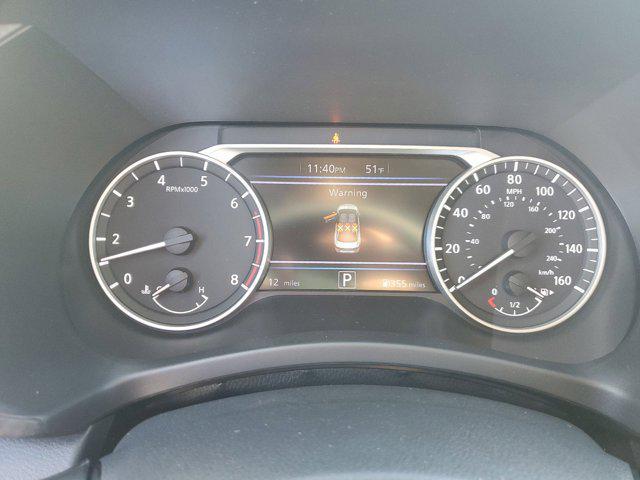 Photo of 2025 Monarch Orange Metallic/Super Black Nissan Sentra