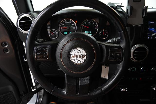 Photo of 2016 Granite Crystal Metallic Clearcoat Jeep Wrangler Unlimited
