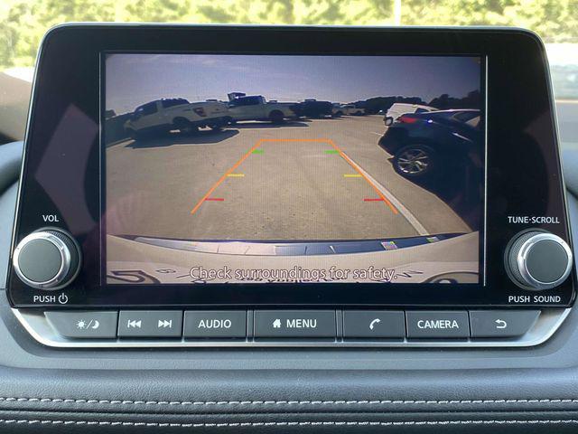 Photo of 2023 Pearl White Tricoat Nissan Rogue