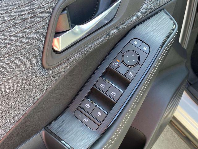 Photo of 2023 Pearl White Tricoat Nissan Rogue