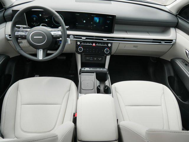 Photo of 2025 Creamy White Pearl Hyundai TUCSON Hybrid