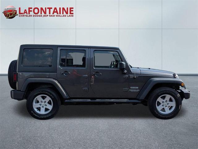 Photo of 2017 Granite Crystal Metallic Clearcoat Jeep Wrangler Unlimited