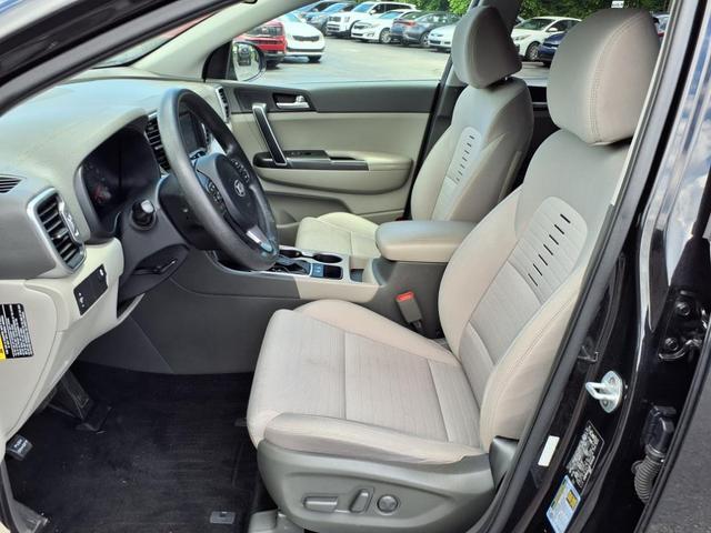 Photo of 2019 Black Cherry Kia Sportage