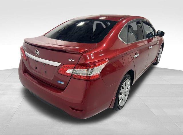 Photo of 2014 Red Brick Nissan Sentra