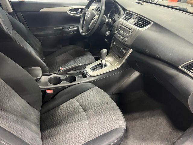 Photo of 2014 Red Brick Nissan Sentra