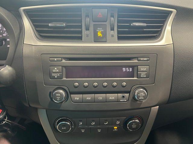Photo of 2014 Red Brick Nissan Sentra