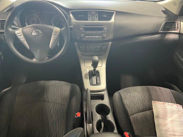 Photo of 2014 Red Brick Nissan Sentra