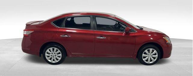 Photo of 2014 Red Brick Nissan Sentra