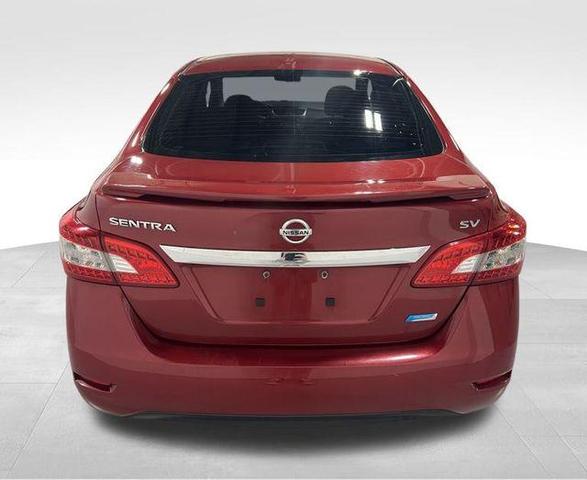 Photo of 2014 Red Brick Nissan Sentra