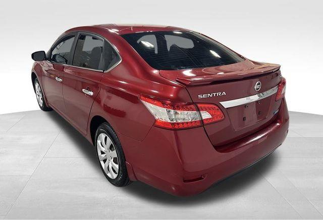 Photo of 2014 Red Brick Nissan Sentra