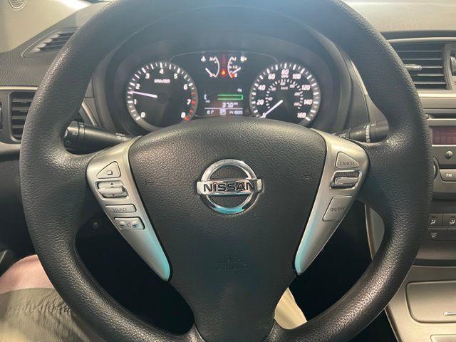 Photo of 2014 Red Brick Nissan Sentra