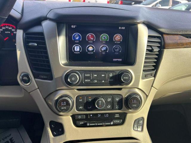 Photo of 2015 White GMC Yukon