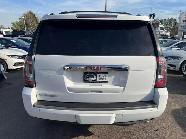 Photo of 2015 White GMC Yukon