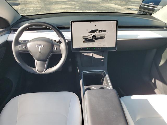 Photo of 2024 Pearl White Multi-Coat Tesla Model Y