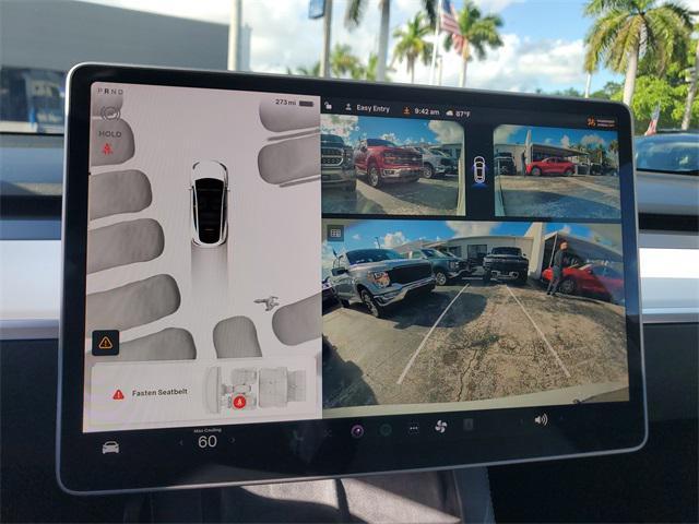 Photo of 2024 Pearl White Multi-Coat Tesla Model Y
