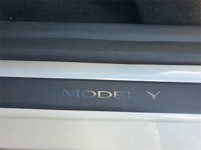 Photo of 2024 Pearl White Multi-Coat Tesla Model Y