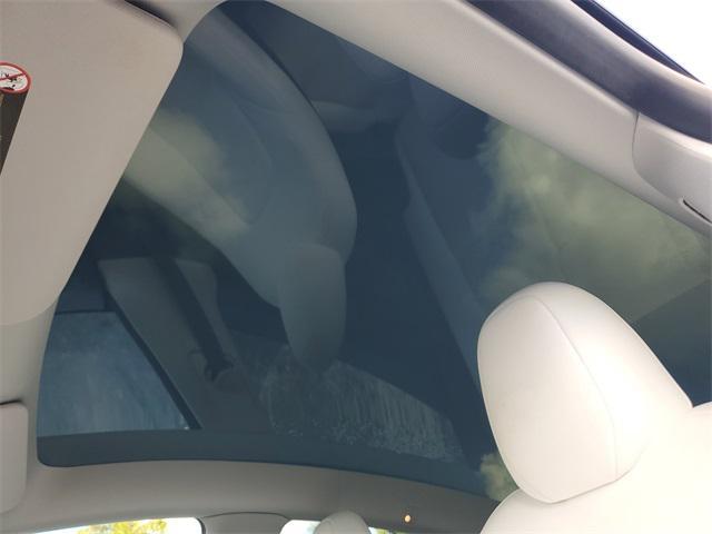 Photo of 2024 Pearl White Multi-Coat Tesla Model Y