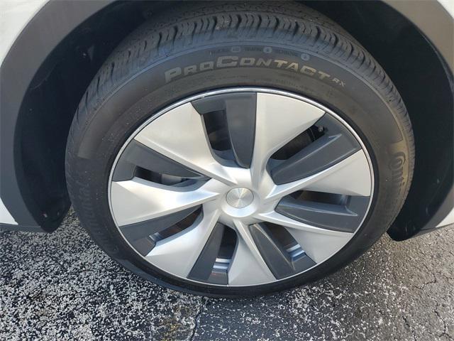 Photo of 2024 Pearl White Multi-Coat Tesla Model Y