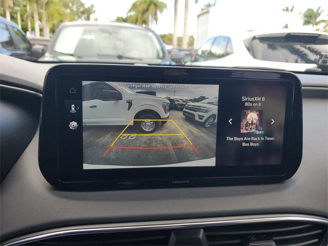 Photo of 2023 Serenity White Pearl Hyundai SANTA FE