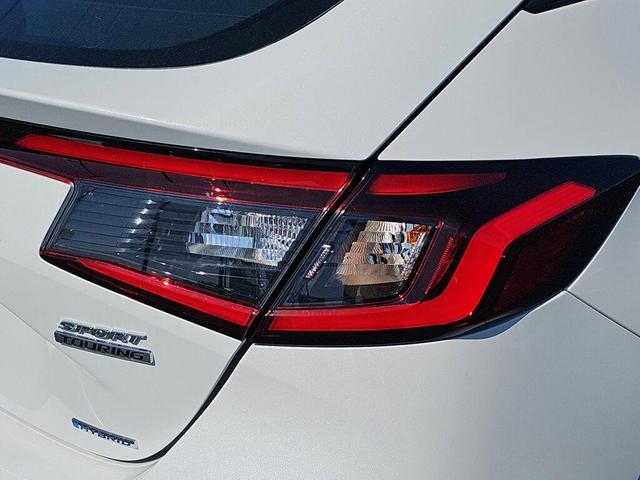 Photo of 2025 Platinum White Pearl Honda Civic Hybrid