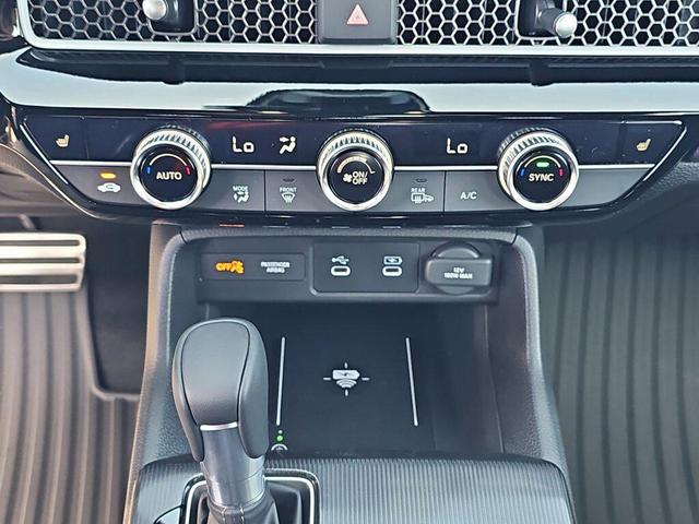 Photo of 2025 Platinum White Pearl Honda Civic Hybrid