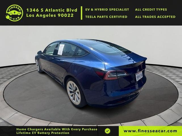 Photo of 2022 Deep Blue Metallic Tesla Model 3