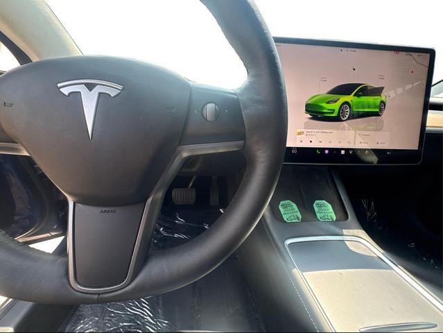 Photo of 2022 Deep Blue Metallic Tesla Model 3