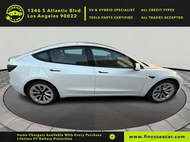 Photo of 2023 Pearl White Multi-Coat Tesla Model 3