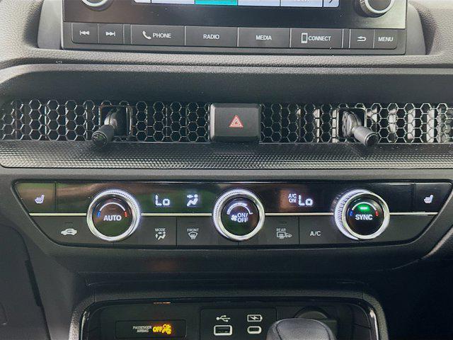 Photo of 2025 Platinum White Pearl Honda CR-V Hybrid