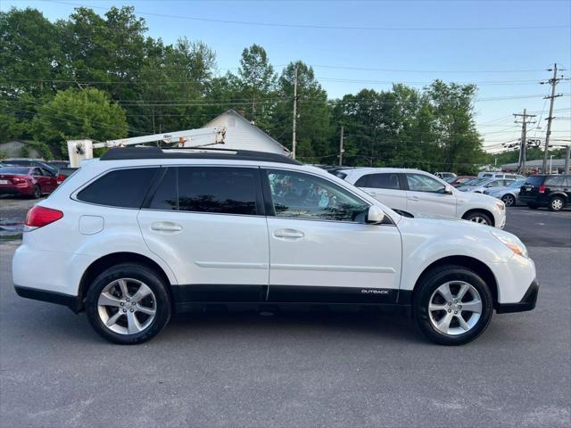 Photo of 2014 Satin White Pearl Subaru Outback