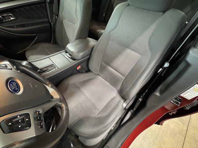 Photo of 2014 SUNSET METALLIC Ford Taurus