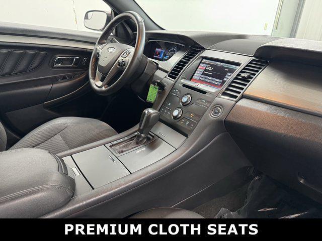 Photo of 2014 SUNSET METALLIC Ford Taurus