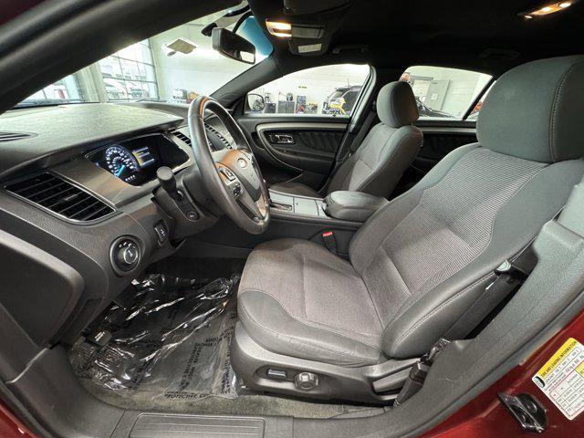 Photo of 2014 SUNSET METALLIC Ford Taurus