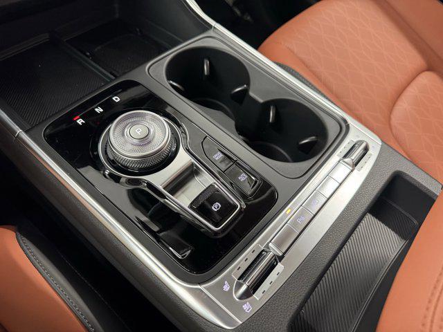 Photo of 2026 Astra Blue Kia Carnival Hybrid