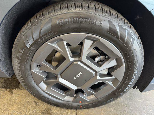 Photo of 2026 Astra Blue Kia Carnival Hybrid