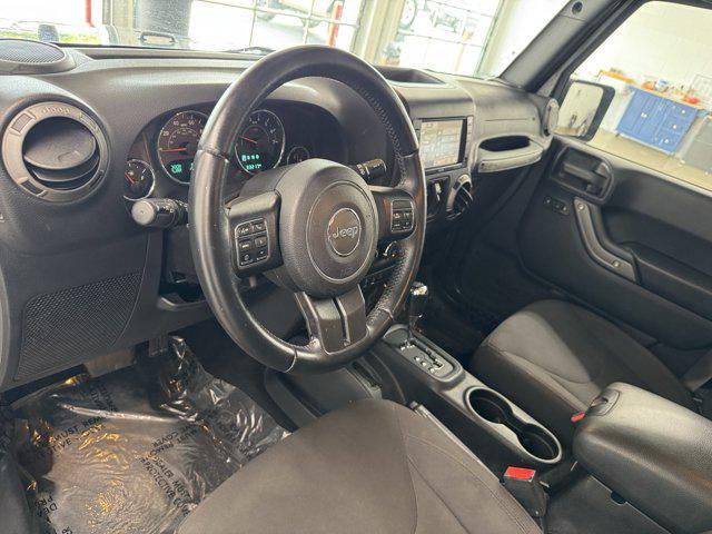 Photo of 2016 Granite Crystal Metallic Clearcoat Jeep Wrangler Unlimited