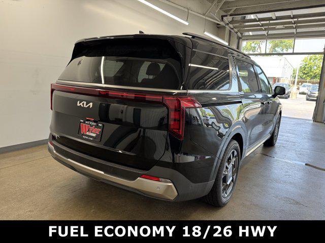 Photo of 2026 Aurora Black Pearl Kia Carnival