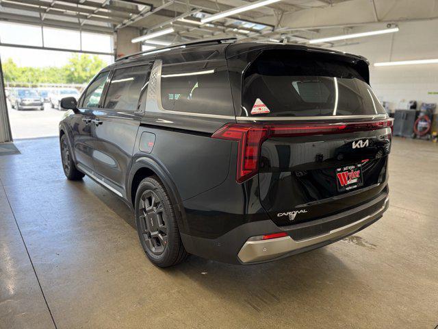 Photo of 2026 Aurora Black Pearl Kia Carnival