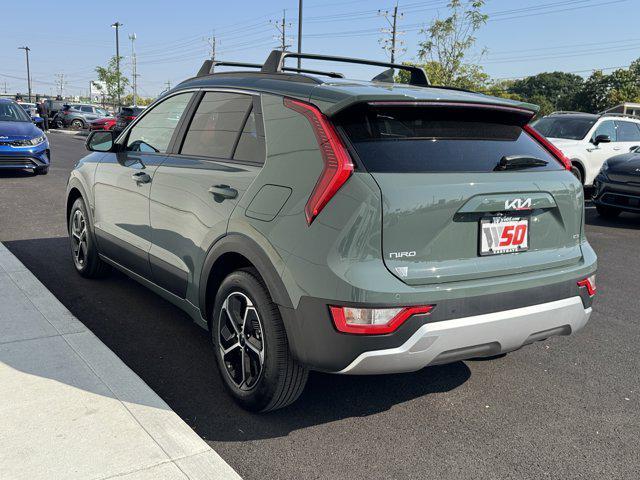 Photo of 2025 Cityscape Green Kia Niro