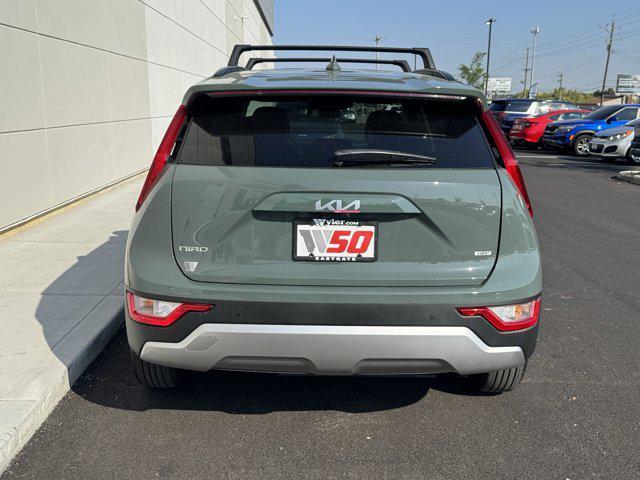 Photo of 2025 Cityscape Green Kia Niro