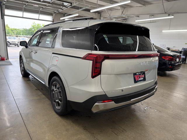 Photo of 2026 Ivory Kia Carnival Hybrid