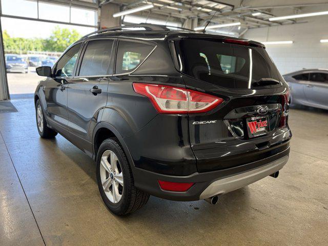 Photo of 2013 TUXEDO BLACK METALLIC Ford Escape