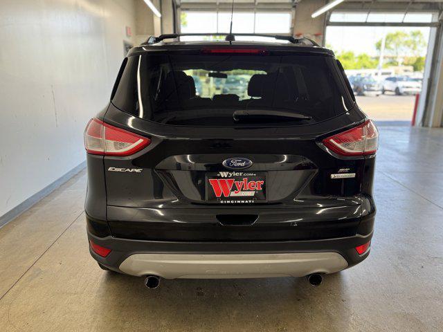 Photo of 2013 TUXEDO BLACK METALLIC Ford Escape